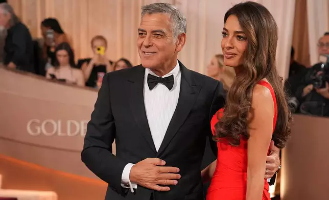 Kevin Hart, left, and Eniko Hart arrive at the 83rd Golden Globes on Sunday, Jan. 11, 2026, at the Beverly Hilton in Beverly Hills, Calif. (Photo by Jordan Strauss/Invision/AP)