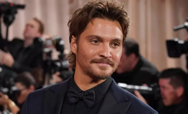 Luke Grimes arrives at the 83rd Golden Globes on Sunday, Jan. 11, 2026, at the Beverly Hilton in Beverly Hills, Calif. (Photo by Jordan Strauss/Invision/AP)