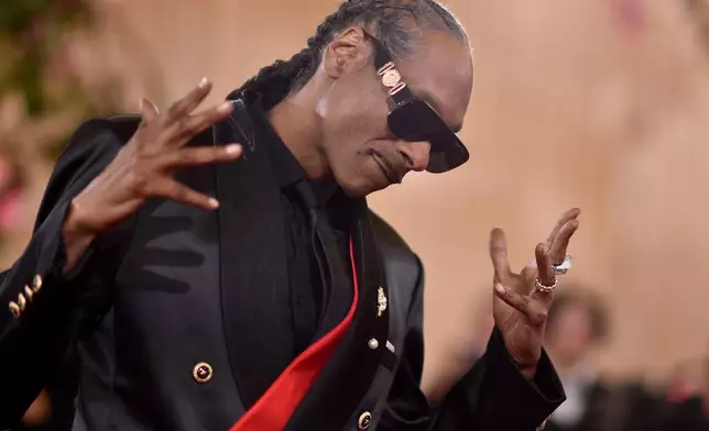 Snoop Dogg arrives at the 83rd Golden Globes on Sunday, Jan. 11, 2026, at the Beverly Hilton in Beverly Hills, Calif. (Photo by Richard Shotwell/Invision/AP)