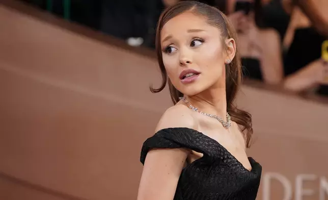 Ariana Grande arrives at the 83rd Golden Globes on Sunday, Jan. 11, 2026, at the Beverly Hilton in Beverly Hills, Calif. (Photo by Jordan Strauss/Invision/AP)