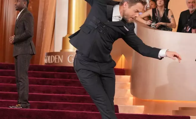 Derek Hough arrives at the 83rd Golden Globes on Sunday, Jan. 11, 2026, at the Beverly Hilton in Beverly Hills, Calif. (Photo by Jordan Strauss/Invision/AP)