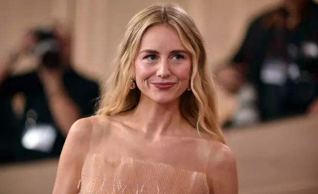 Justine Lupe arrives at the 83rd Golden Globes on Sunday, Jan. 11, 2026, at the Beverly Hilton in Beverly Hills, Calif. (Photo by Richard Shotwell/Invision/AP)