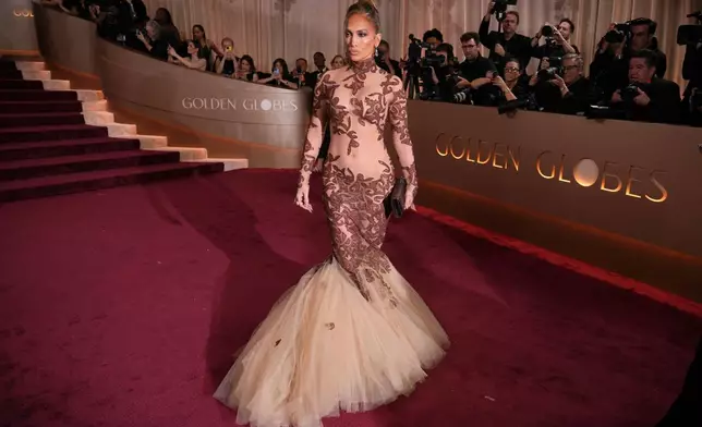Jennifer Lopez arrives at the 83rd Golden Globes on Sunday, Jan. 11, 2026, at the Beverly Hilton in Beverly Hills, Calif. (Photo by Jordan Strauss/Invision/AP)