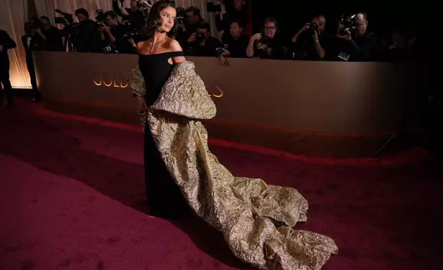 Maura Higgins arrives at the 83rd Golden Globes on Sunday, Jan. 11, 2026, at the Beverly Hilton in Beverly Hills, Calif. (Photo by Jordan Strauss/Invision/AP)