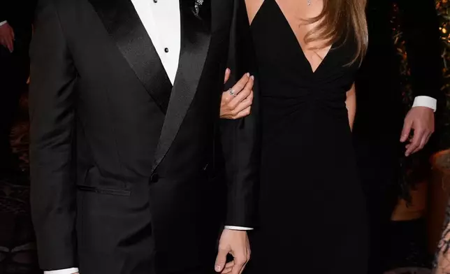 Dave Franco, left, and Alison Brie arrive at the 83rd Golden Globes on Sunday, Jan. 11, 2026, at the Beverly Hilton in Beverly Hills, Calif. (AP Photo/Chris Pizzello)