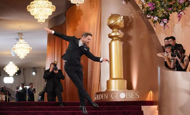 Derek Hough arrives at the 83rd Golden Globes on Sunday, Jan. 11, 2026, at the Beverly Hilton in Beverly Hills, Calif. (Photo by Jordan Strauss/Invision/AP)