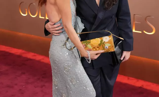 Natasha Lyonne, left, and Clea DuVall arrive at the 83rd Golden Globes on Sunday, Jan. 11, 2026, at the Beverly Hilton in Beverly Hills, Calif. (Photo by Jordan Strauss/Invision/AP)