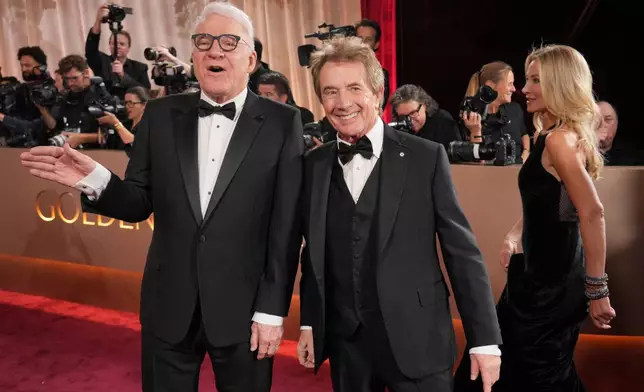 Steve Martin, left, and Martin Short arrive at the 83rd Golden Globes on Sunday, Jan. 11, 2026, at the Beverly Hilton in Beverly Hills, Calif. (Photo by Jordan Strauss/Invision/AP)