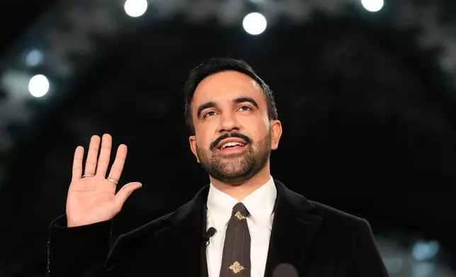 Mayor-elect Zohran Mamdani takes the oath of office during a swearing-in ceremony in the Old City Hall subway station, Thursday, Jan. 1, 2026, in New York. (AP Photo/Yuki Iwamura)