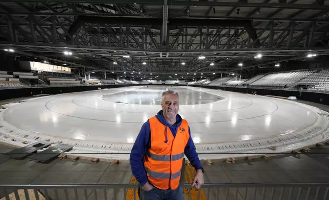 Ice Master Mark Messer poses in the stadium where speed skating discipline of the Milan Cortina 2026 Winter Olympics will take place, in Rho, outskirt of Milan, Tuesday, Nov. 11, 2025. (AP Photo/Luca Bruno)