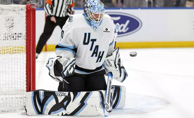 Utah Mammoth goaltender Karel Vejmelka makes a save in the second period of an NHL hockey game against the New York Islanders, Thursday, Jan. 1, 2026, in Elmont, N.Y. (AP Photo/Adam Hunger)