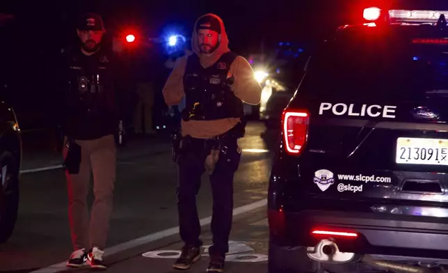 Police respond to a fatal shooting in a parking lot of The Church of Jesus Christ of Latter-day Saints in Salt Lake City on Wednesday, Jan. 7, 2026. (AP Photo/Hannah Schoenbaum)