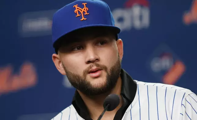 Bo Bichette speaks during his introductory press conference with the New York Mets, Wednesday, Jan. 21, 2026, in New York. (AP Photo/Heather Khalifa)