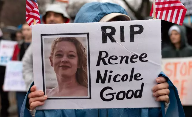 Demonstrators protest outside the White House in Washington, Saturday, Jan. 10, 2026, against the Immigration and Customs Enforcement agent who fatally shot Renee Good in Minneapolis. (AP Photo/Jose Luis Magana)