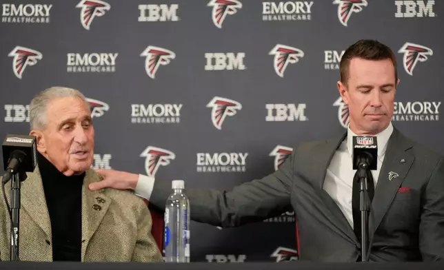 Former Falcons quarterback Matt Ryan speaks during a news conference as the new Atlanta Falcons president of football, along with Atlanta Falcons owner Arthur Blank, Tuesday, Jan. 13, 2026, in Flowery Branch, Ga. (AP Photo/Brynn Anderson)
