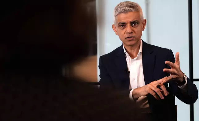 Mayor of London Sadiq Khan speaks during an interview in London, Monday, Jan. 12, 2026. (AP Photo/Kirsty Wigglesworth)