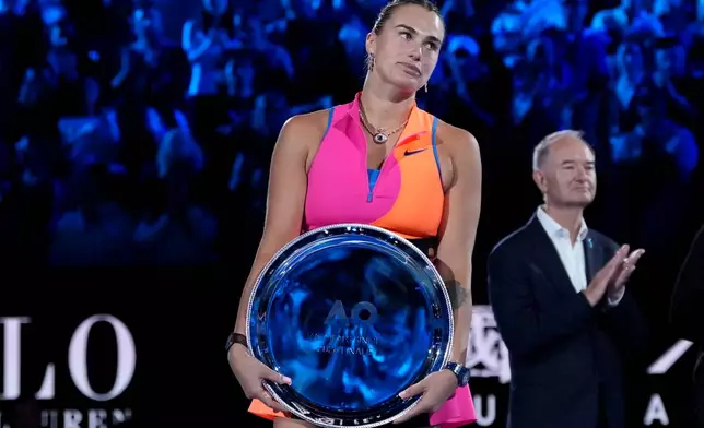 Aryna Sabalenka of Belarus reacts after losing her match against Elena Rybakina of Kazakhstan in the women's singles final at the Australian Open tennis championship in Melbourne, Australia, Saturday, Jan. 31, 2026. (AP Photo/Aaron Favila)