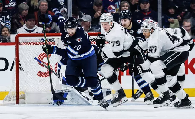 Winnipeg Jets' Tanner Pearson (70) makes his way out of his zone against the Los Angeles Kings during the second period of an NHL game in Winnipeg, Friday, January 9, 2026. (John Woods/The Canadian Press via AP)
