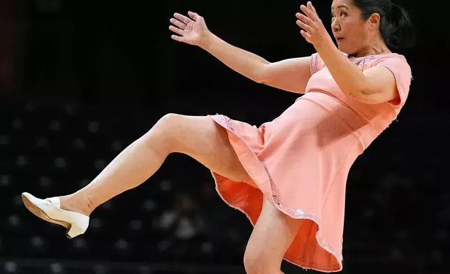 Red Panda performs during halftime of an NCAA college basketball game between Miami and Stanford in Coral Gables, Fla., Wednesday, Jan. 28, 2026. (AP Photo/Rebecca Blackwell)