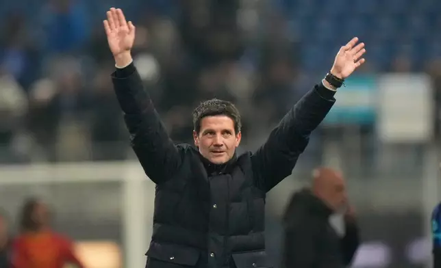 Inter Milan's head coach Cristian Chivu reacts at the end of the Serie A soccer match between Inter Milan and Lecce in Milan, Italy, Wednesday, Jan. 14, 2026. (AP Photo/Luca Bruno)