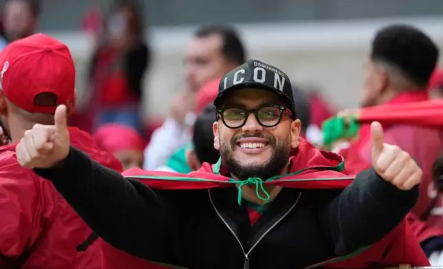 Morocco fan waits for the Africa Cup of Nations final soccer match between Senegal and Morocco, in Rabat, Morocco, Sunday, Jan. 18, 2026. (AP Photo/Mosa'ab Elshamy)