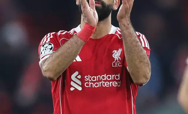 Liverpool's Mohamed Salah applauds fans at the end of the Champions League soccer match between Liverpool and Qarabag in Liverpool, Wednesday, Jan. 28, 2026. (AP Photo/Darren Staples)