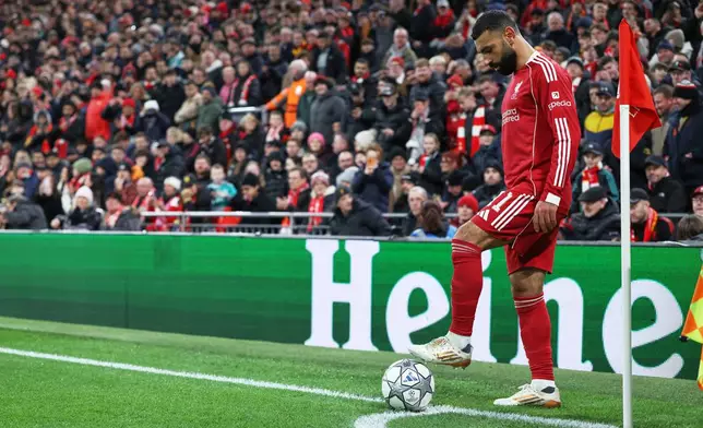 Liverpool's Mohamed Salah prepares to execute a corner kick during the Champions League soccer match between Liverpool and Qarabag in Liverpool, Wednesday, Jan. 28, 2026. (AP Photo/Darren Staples)