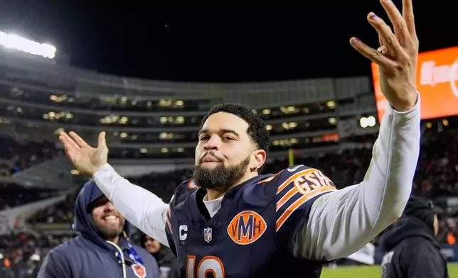 Chicago Bears' Caleb Williams celebrates after an NFL wild-card playoff football game against the Green Bay Packers Saturday, Jan. 10, 2026, in Chicago. (AP Photo/Erin Hooley)