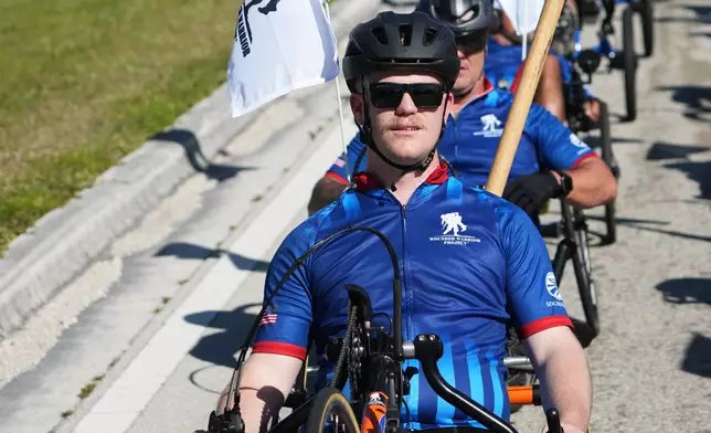 U. S. Force veteran Spencer Charron rides in the annual Florida Keys Soldier Ride organized by the Wounded Warrior Project, Friday, Jan. 9, 2026, in Marathon, Fla. (AP Photo/Lynne Sladky)