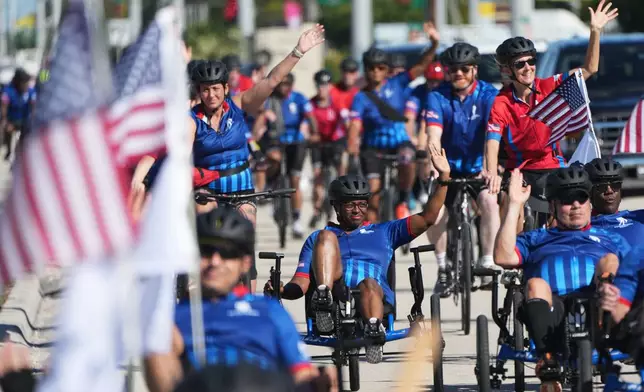 Wounded veterans ride in the annual Florida Keys Soldier Ride organized by the Wounded Warrior Project, Friday, Jan. 9, 2026, in Marathon, Fla. (AP Photo/Lynne Sladky)