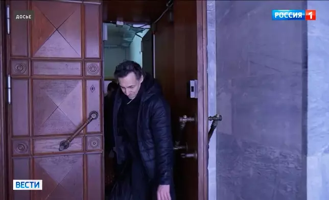 In this image, made from video and provided by Russian Federal Security Service via Russia-1 TV channel on Thursday, Jan. 8, 2026, Laurent Vinatier, a French political scholar serving a three-year sentence in Russia and facing new charges of espionage, is shown being released from prison in a prisoner swap with France. (Russian Federal Security Service/Russia-1 TV channel via AP)