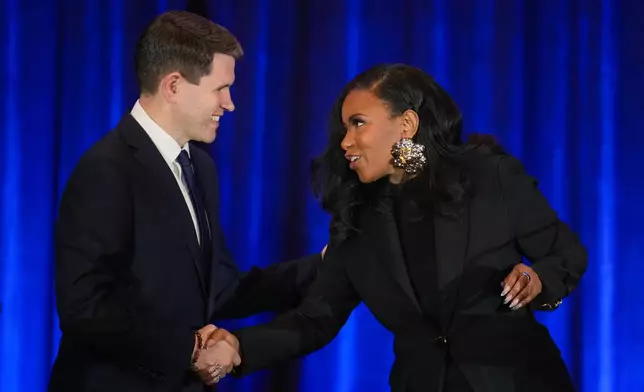 Texas state Rep. James Talarico, D-Austin, left, shakes hands with Rep. Jasmine Crockett, D-Texas, prior a debate during the Texas AFL-CIO Committee on Political Education Convention, Saturday, Jan. 24, 2026, in Georgetown, Texas. (Bob Daemmrich/Texas Tribune via AP, Pool)