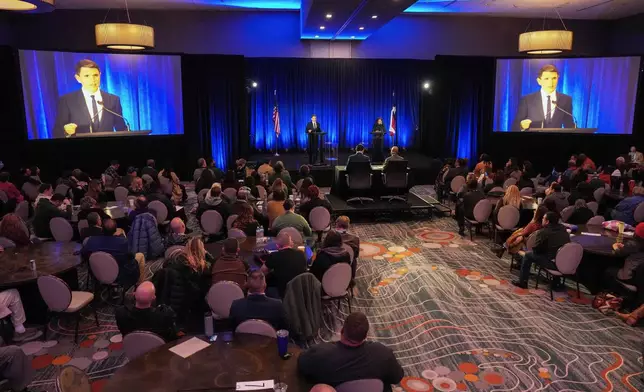 Democratic primary candidates for U.S. Senate, Texas state Rep. James Talarico, D-Austin, left, and Rep. Jasmine Crockett, right, participate in a debate during the Texas AFL-CIO Committee on Political Education Convention, Saturday, Jan. 24, 2026, in Georgetown, Texas. (Bob Daemmrich/Texas Tribune via AP, Pool)