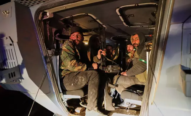 Syrian government forces take over the Achrafieh neighborhood from Kurdish fighters during ongoing clashes that erupted Tuesday in a contested area of the northern city of Aleppo, Syria, Thursday, Jan. 8, 2026. (AP Photo/Omar Albam)