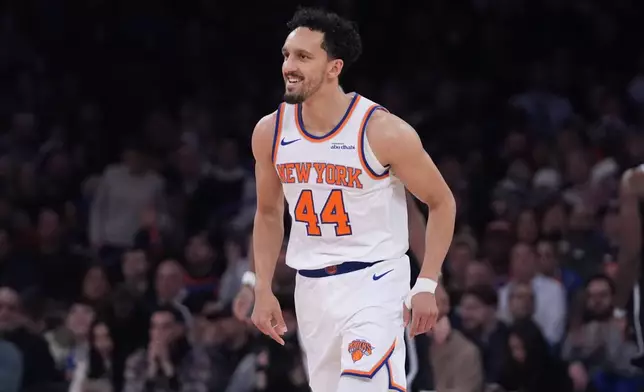 New York Knicks' Landry Shamet smiles after making a three-point shot during the second half of an NBA basketball game against the Brooklyn Nets Wednesday, Jan. 21, 2026, in New York. (AP Photo/Frank Franklin II)