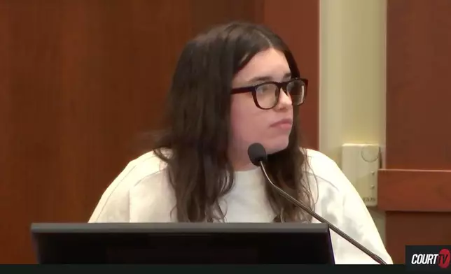 This image taken from video, Juliana Peres Magalhães testifies during the trial of Brendan Banfield, charged with aggravated murder in the 2023 killings of Christine Banfield and Joseph Ryan, on Tuesday, Jan. 13, 2026 in Fairfax, Va. (Court TV via AP, Pool)