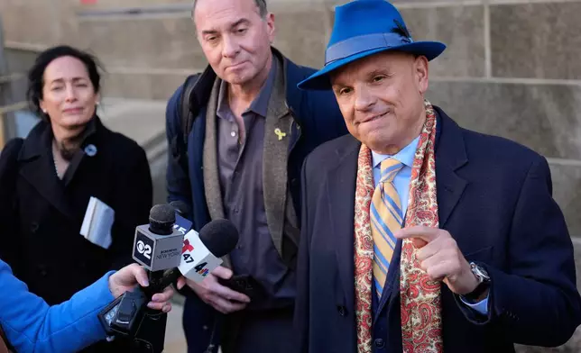 Arthur Aidala, an attorney for Harvey Weinstein, right, talks to reporters outside the courthouse in New York, Thursday, Jan. 8, 2026. (AP Photo/Seth Wenig)
