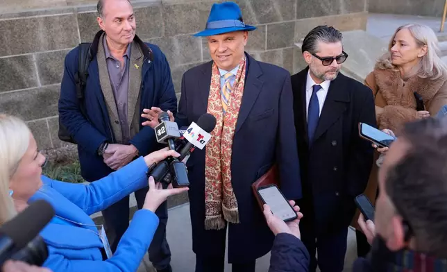 Arthur Aidala, an attorney for Harvey Weinstein, center, talks to reporters outside the courthouse in New York, Thursday, Jan. 8, 2026. (AP Photo/Seth Wenig)