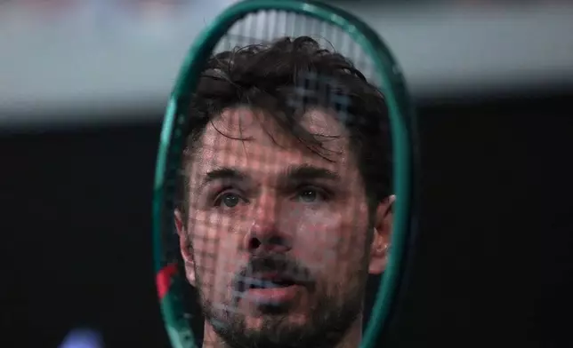 Stan Wawrinka of Switzerland reacts during his third round match against Taylor Fritz of the U.S. at the Australian Open tennis championship in Melbourne, Australia, Saturday, Jan. 24, 2026. (AP Photo/Asanka Brendon Ratnayake)