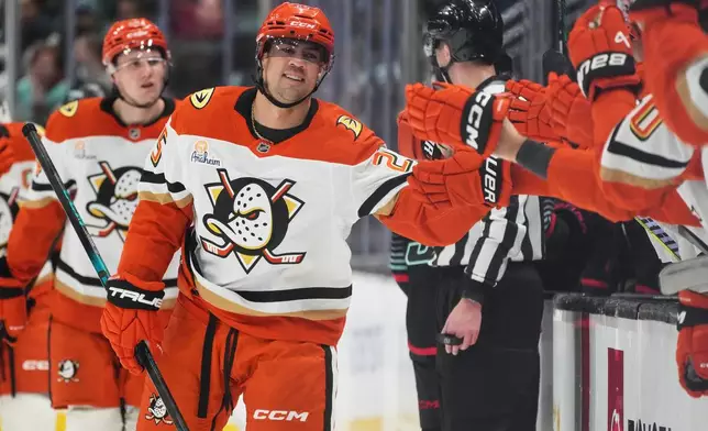 Anaheim Ducks center Ryan Poehling celebrates his goal against the Seattle Kraken during the first period of an NHL hockey game Friday, Jan. 23, 2026, in Seattle. (AP Photo/Lindsey Wasson)