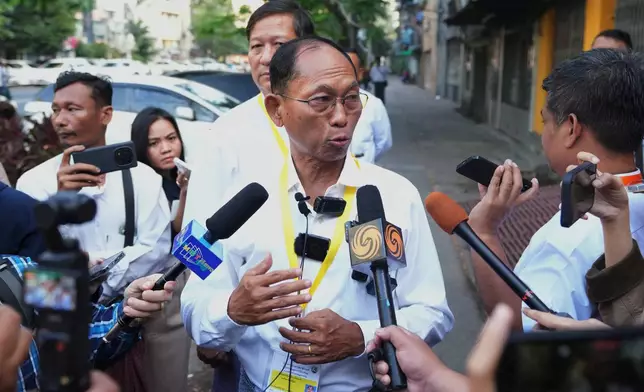 Ko Ko Gyi, chairman of the People's Party and leader of Myanmar's 1988 pro-democracy uprising, talks to journalists after casting his ballot at a polling station during the final round of general election Sunday, Jan. 25, 2026, in Yangon, Myanmar. (AP Photo/Thein Zaw)