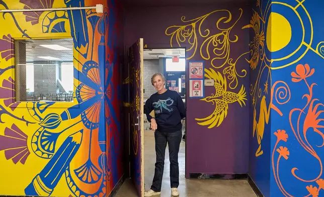 Art teacher Joyce Hatzidakis poses for a portrait in her classroom Thursday, Jan. 22, 2026, Riverside, Calif. (AP Photo/Damian Dovarganes)