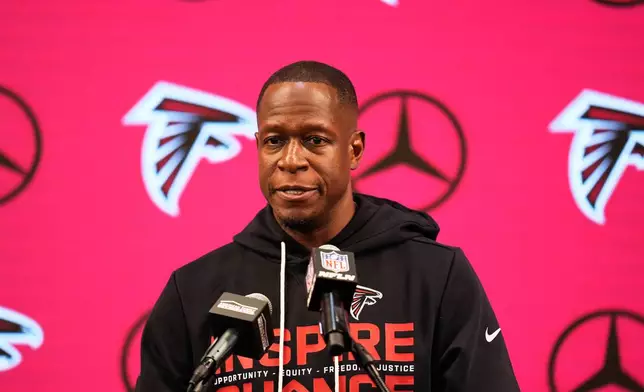 Atlanta Falcons head coach Raheem Morris talks to reporters after an NFL football game against the New Orleans Saints, Sunday, Jan. 4, 2026, in Atlanta. (AP Photo/Mike Stewart)