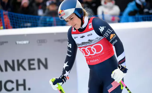 United States' Lindsey Vonn at the finish line after crashing, during an alpine ski, women’s World Cup downhill, in Crans Montana, Switzerland, Friday, Jan. 30, 2026. (Alessandro della Valle/Keystone via AP)