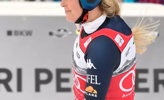 United States' Lindsey Vonn at the finish line after crashing, during an alpine ski, women's World Cup downhill, in Crans Montana , Switzerland, Friday, Jan. 30, 2026. (AP Photo/Giovanni Auletta)