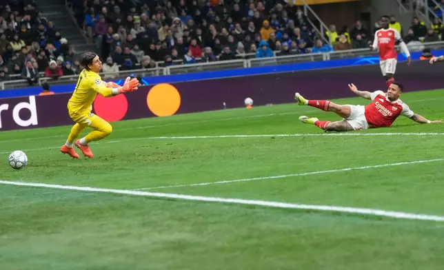 Arsenal's Gabriel Jesus scores his side's opening goal during the Champions League opening phase soccer match between Inter Milan and Arsenal in Milan, Italy, Tuesday, Jan. 20, 2026. (AP Photo/Luca Bruno)