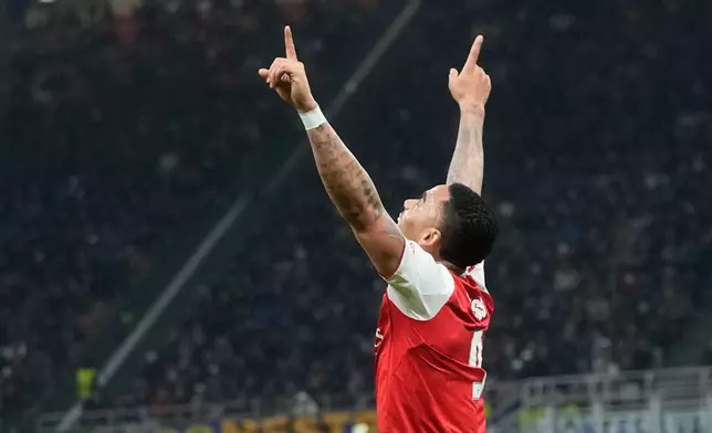 Arsenal's Gabriel Jesus celebrates after scoring his side's second goal during the Champions League opening phase soccer match between Inter Milan and Arsenal in Milan, Italy, Tuesday, Jan. 20, 2026. (AP Photo/Luca Bruno)