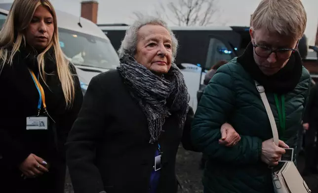 Holocaust survivor Bronislawa Horowitz-Karakulska attends a ceremony marking the 81th anniversary of the camp's liberation in the Auschwitz Nazi death camp museum in Oswiecim, Poland, Tuesday, Jan. 27, 2026. (AP Photo/Beata Zawrzel)