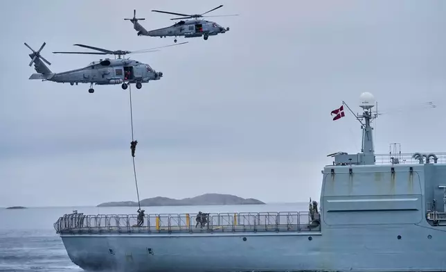 FILE - Danish military forces participate in an exercise with hundreds of troops from several European NATO members in the Arctic Ocean in Nuuk, Greenland, Sept. 15, 2025. (AP Photo/Ebrahim Noroozi, File)