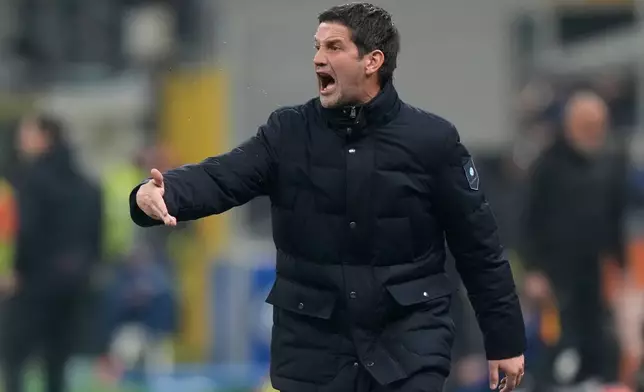 Inter Milan's head coach Cristian Chivu gives instructions during the Serie A soccer match between Inter Milan and Lecce in Milan, Italy, Wednesday, Jan. 14, 2026. (AP Photo/Luca Bruno)